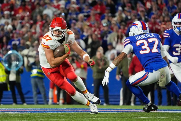 Nov 2, 2025; Orchard Park, New York, USA; Kansas City Chiefs tight end Travis Kelce (87) runs with the ball in the second quarter against the Buffalo Bills at Highmark Stadium. Mandatory Credit: Gregory Fisher-Imagn Images