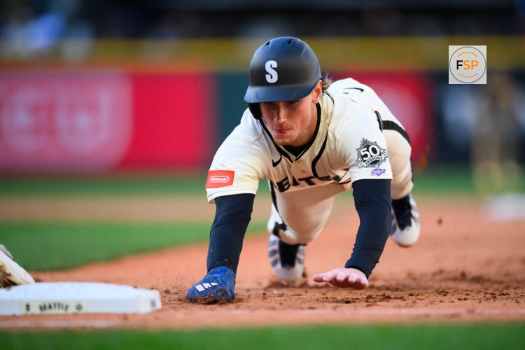 May 17, 2026; Seattle, Washington, USA; Seattle Mariners third baseman Colt Emerson (4) returns to first base during the sixth inning against the San Diego Padres at T-Mobile Park. Credit: Steven Bisig-Imagn Images