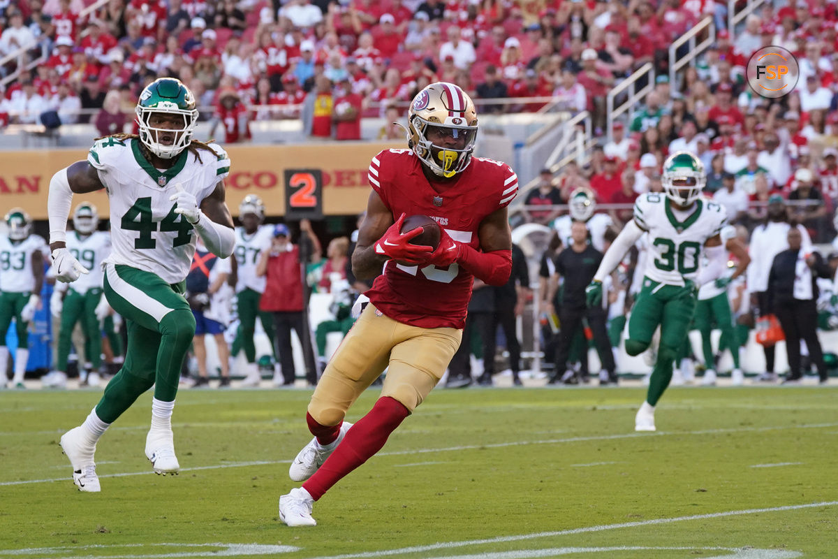 Sep 9, 2024; Santa Clara, California, USA; San Francisco 49ers wide receiver Jauan Jennings (15) advances upfield after a catch in the second quarter against the New York Jets at Levi's Stadium. Credit: David Gonzales-Imagn Images