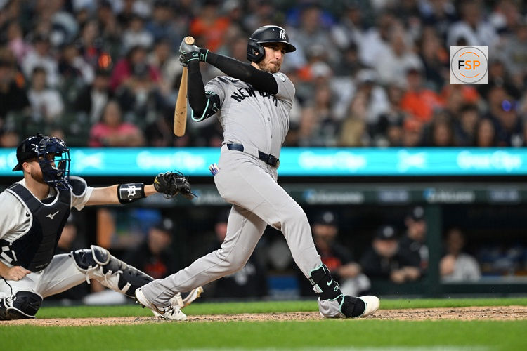 Jun 24, 2026; Detroit, Michigan, USA; New York Yankees left fielder Cody Bellinger (35) hits a double against the Detroit Tigers in the ninth inning at Comerica Park. Credit: Lon Horwedel-Imagn Images