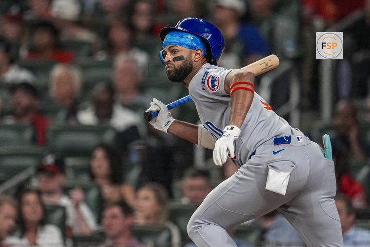 Sep 10, 2025; Cumberland, Georgia, USA; Chicago Cubs third baseman Willi Castro (1) singles against the Atlanta Braves during the sixth inning at Truist Park. Credit: Dale Zanine-Imagn Images