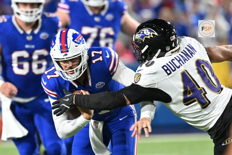 Sep 7, 2025; Orchard Park, New York, USA;  Buffalo Bills quarterback Josh Allen (17) runs the ball defended by Baltimore Ravens linebacker Teddye Buchanan (40) during the third quarter at Highmark Stadium. Credit: Mark Konezny-Imagn Images