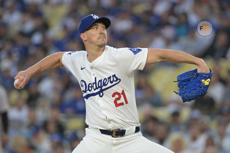 Aug 28, 2024; Los Angeles, California, USA;  Los Angeles Dodgers starting pitcher Walker Buehler (21) delivers to the plate in the first inning against the Baltimore Orioles at Dodger Stadium. Credit: Jayne Kamin-Oncea-USA TODAY Sports