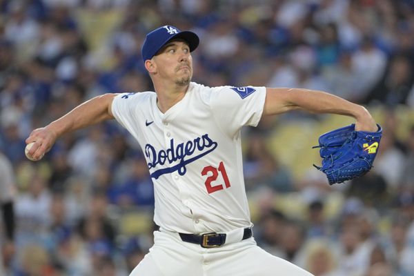Aug 28, 2024; Los Angeles, California, USA;  Los Angeles Dodgers starting pitcher Walker Buehler (21) delivers to the plate in the first inning against the Baltimore Orioles at Dodger Stadium. Mandatory Credit: Jayne Kamin-Oncea-USA TODAY Sports