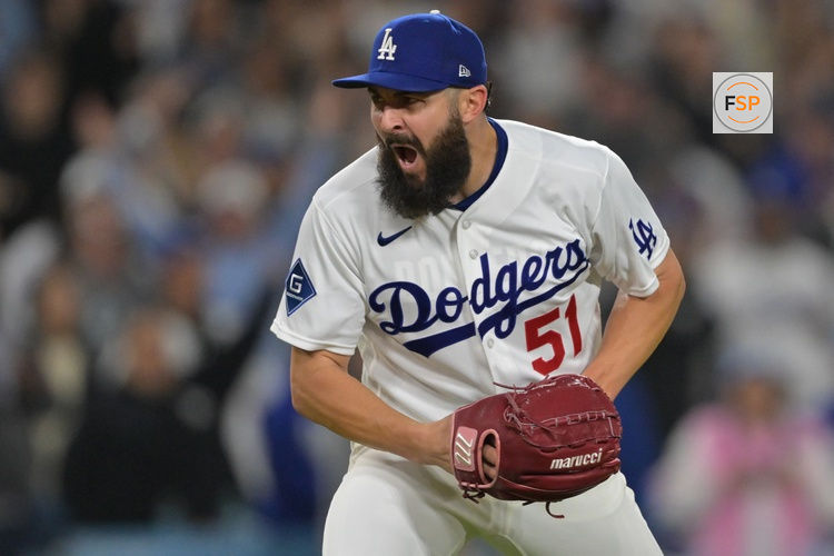 Apr 14, 2026; Los Angeles, California, USA;  Los Angeles Dodgers pitcher Alex Vesia (51) reacts after the final out of the ninth as he earned a save against the New York Mets at Dodger Stadium. Credit: Jayne Kamin-Oncea-Imagn Images