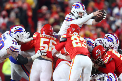 Jan 26, 2025; Kansas City, MO, USA; Buffalo Bills quarterback Josh Allen (17) dives for a first down against the Kansas City Chiefs during the second half in the AFC Championship game at GEHA Field at Arrowhead Stadium. Mandatory Credit: Mark J. Rebilas-Imagn Images