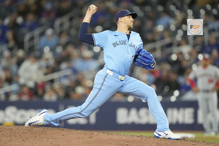 Apr 1, 2025; Toronto, Ontario, CAN; Toronto Blue Jays pitcher Jeff Hoffman (23) pitches to the Washington Nationals during the ninth inning at Rogers Centre. Credit: John E. Sokolowski-Imagn Images