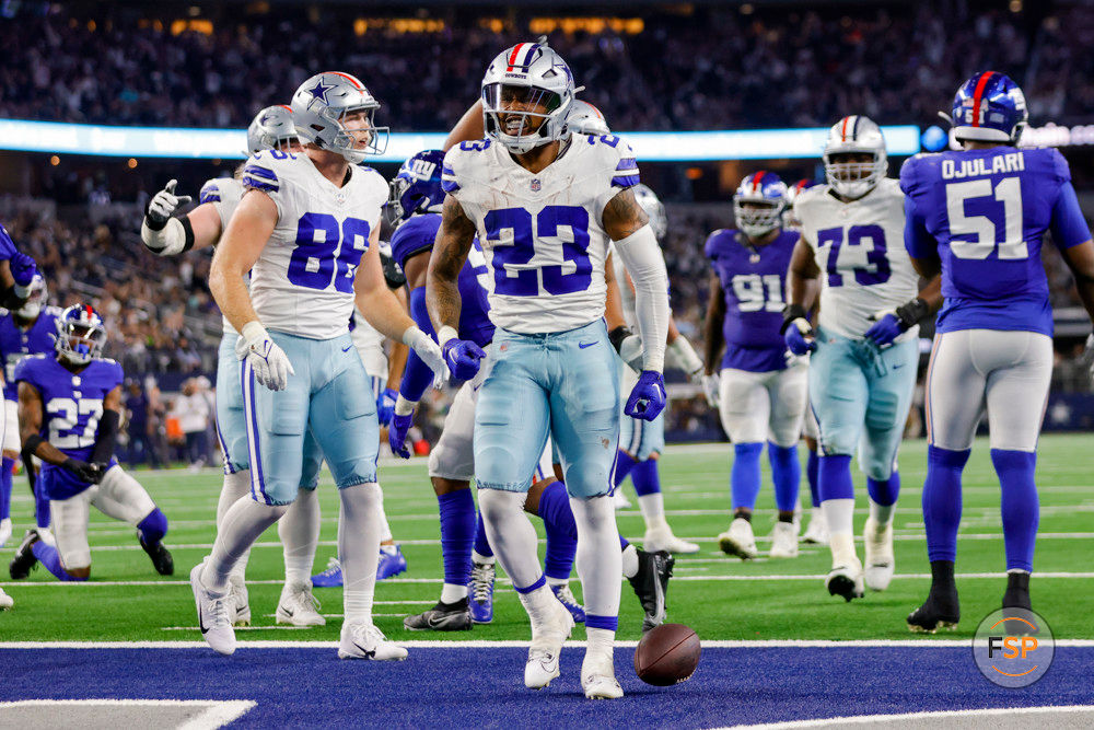 ARLINGTON, TX - NOVEMBER 12: Dallas Cowboys running back Rico Dowdle (23) scores a touchdown and celebrates during the game between the Dallas Cowboys and the New York Giants on November 12, 2023 at AT&T Stadium in Arlington, Texas. (Photo by Matthew Pearce/Icon Sportswire)