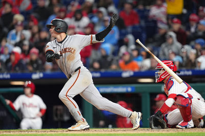 Apr 16, 2025; Philadelphia, Pennsylvania, USA; San Francisco Giants infielder Tyler Fitzgerald (49) hits an RBI double against the Philadelphia Phillies in the seventh inning at Citizens Bank Park. Mandatory Credit: Kyle Ross-Imagn Images