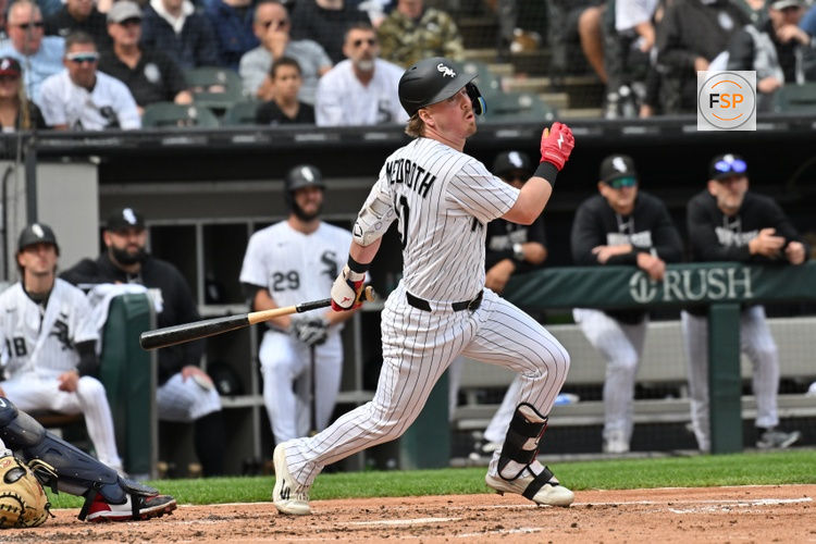 Jun 24, 2026; Chicago, Illinois, USA; Chicago White Sox second baseman Chase Meidroth (10) hits a single against the Cleveland Guardians during the second inning at Rate Field. Credit: Patrick Gorski-Imagn Images
