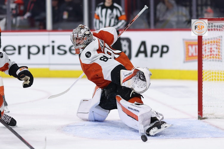 Jan 8, 2026; Philadelphia, Pennsylvania, USA; Philadelphia Flyers goaltender Dan Vladar (80) makes a saveagainst the Toronto Maple Leafs during the second period at Xfinity Mobile Arena. Credit: Bill Streicher-Imagn Images