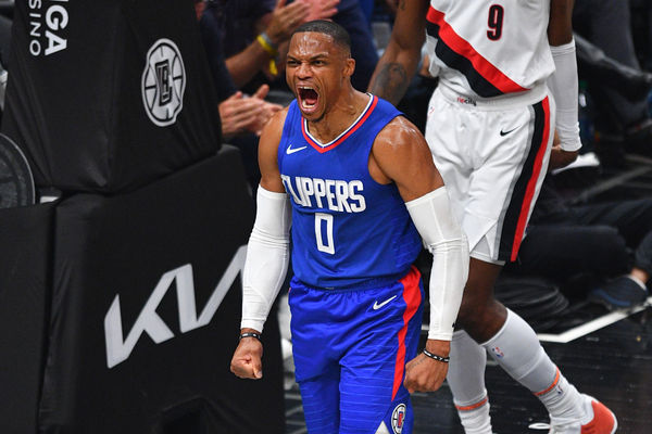 LOS ANGELES, CA - OCTOBER 25: Los Angeles Clippers guard Russell Westbrook (0) screams after a dunk during a NBA game between the Denver Nuggets and the Portland Trail Blazers on October 25, 2023 at Crypto.com Arena in Los Angeles, CA. (Photo by Brian Rothmuller/Icon Sportswire)