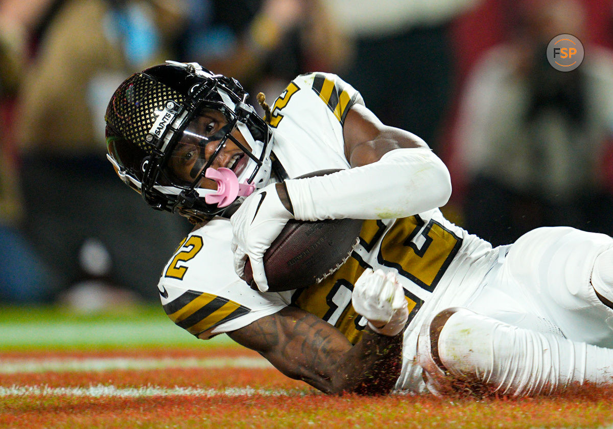 Oct 7, 2024; Kansas City, Missouri, USA; New Orleans Saints wide receiver Rashid Shaheed (22) catches a touchdown pass during the first half against the Kansas City Chiefs at GEHA Field at Arrowhead Stadium. Credit: Jay Biggerstaff-Imagn Images