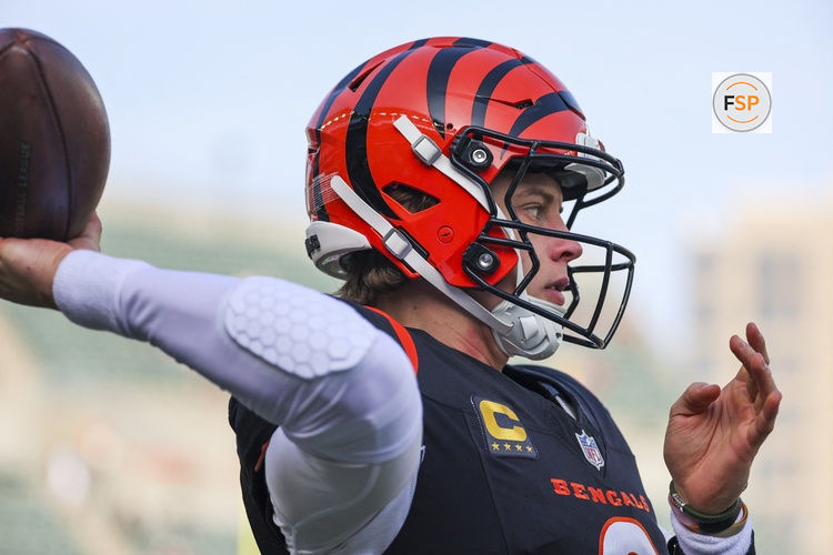 Jan 4, 2026; Cincinnati, Ohio, USA; Cincinnati Bengals quarterback Joe Burrow (9) participates in pregame warmups against the Cleveland Browns at Paycor Stadium. Credit: Joseph Maiorana-Imagn Images