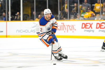 Oct 17, 2024; Nashville, Tennessee, USA;  Edmonton Oilers defenseman Evan Bouchard (2) skates with the puck against the Nashville Predators during the second period at Bridgestone Arena. Mandatory Credit: Steve Roberts-Imagn Images