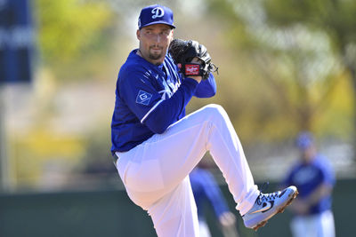 Feb 18, 2025; Glendale, AZ, USA;  Los Angeles Dodgers starting pitcher Blake Snell (7) throws live batting practice during spring training workouts at Camelback Ranch. Mandatory Credit: Jayne Kamin-Oncea-Imagn Images