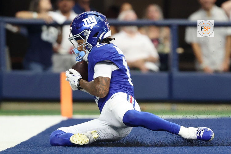 Sep 14, 2025; Arlington, Texas, USA; New York Giants wide receiver Wan'Dale Robinson (17) makes a catch for a touchdown against the New York Giants during the fourth quarter at AT&T Stadium. Credit: Kevin Jairaj-Imagn Images