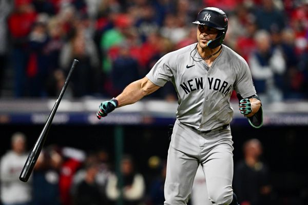 Oct 19, 2024; Cleveland, Ohio, USA; New York Yankees designated hitter Giancarlo Stanton (27) celebrates after hitting a two run home run during the sixth inning against the Cleveland Guardians during game five of the ALCS for the 2024 MLB playoffs at Progressive Field. Mandatory Credit: David Dermer-Imagn Images