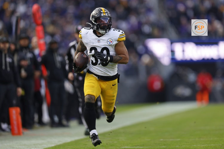 Dec 7, 2025; Baltimore, Maryland, USA; Pittsburgh Steelers running back Jaylen Warren (30) runs with the ball for a touchdown against the Baltimore Ravens during the second half at M&T Bank Stadium. Credit: Peter Casey-Imagn Images