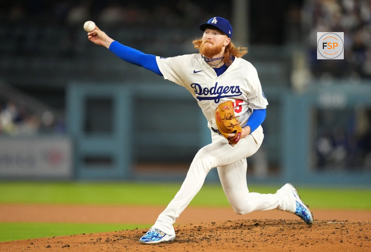 Apr 14, 2025; Los Angeles, California, USA; Los Angeles Dodgers pitcher Dustin May (85) throws during the third inning against the Colorado Rockies at Dodger Stadium. Credit: Kirby Lee-Imagn Images