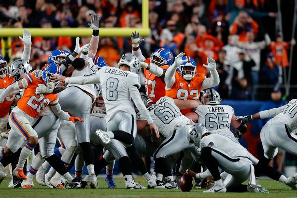 Nov 6, 2025; Denver, Colorado, USA; Las Vegas Raiders place kicker Daniel Carlson (8) misses a field goal as Denver Broncos defensive tackle D.J. Jones (93) and wide receiver A.T. Perry (87) defend in the fourth quarter at Empower Field at Mile High. Mandatory Credit: Isaiah J. Downing-Imagn Images