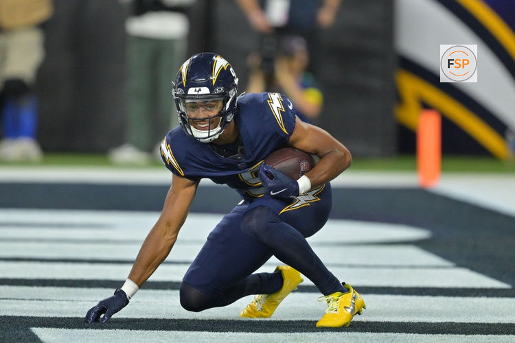 Oct 23, 2025; Inglewood, California, USA; Los Angeles Chargers wide receiver Tre' Harris (9) makes a touchdown catch against the Minnesota Vikings during the second half at SoFi Stadium. Credit: Jayne Kamin-Oncea-Imagn Images
