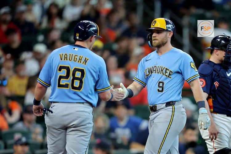 May 31, 2026; Houston, Texas, USA; Milwaukee Brewers left fielder Jake Bauers (9) is congratulated by first baseman Andrew Vaughn (28) after hitting a two-run home run to left field against the Houston Astros during the fourth inning at Daikin Park. Credit: Erik Williams-Imagn Images