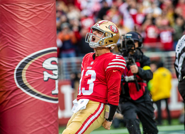 SANTA CLARA, CA - DECEMBER 11: San Francisco 49ers quarterback Brock Purdy (13) celebrates a touchdown in the second quarter of an NFL game between the San Francisco 49ers and Tampa Bay Buccaneers on December 11, 2022, at Levi’s Stadium, in Santa Clara, CA. (Photo by Tony Ding/Icon Sportswire)