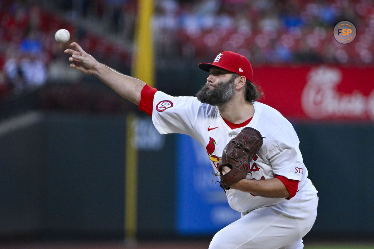 Sep 11, 2024; St. Louis, Missouri, USA;  St. Louis Cardinals starting pitcher Lance Lynn (31) pitches against the Cincinnati Reds during the first inning at Busch Stadium. Credit: Jeff Curry-Imagn Images