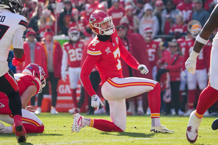 Dec 21, 2024; Kansas City, Missouri, USA; Kansas City Chiefs place kicker Harrison Butker (7) kicks the point after touchdown against the Houston Texans during the first half at GEHA Field at Arrowhead Stadium. Credit: Denny Medley-Imagn Images