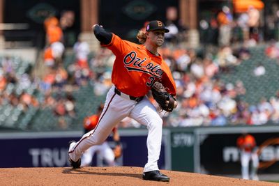 Jul 26, 2026; Baltimore, Maryland, USA; Baltimore Orioles pitcher Shane Baz (34) pitching in the first inning against the Atlanta Braves at Oriole Park at Camden Yards. Mandatory Credit: Lexi Thompson-Imagn Images