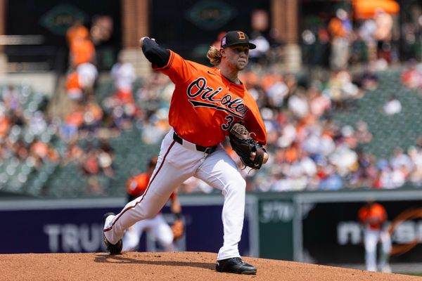 Jul 26, 2026; Baltimore, Maryland, USA; Baltimore Orioles pitcher Shane Baz (34) pitching in the first inning against the Atlanta Braves at Oriole Park at Camden Yards. Mandatory Credit: Lexi Thompson-Imagn Images
