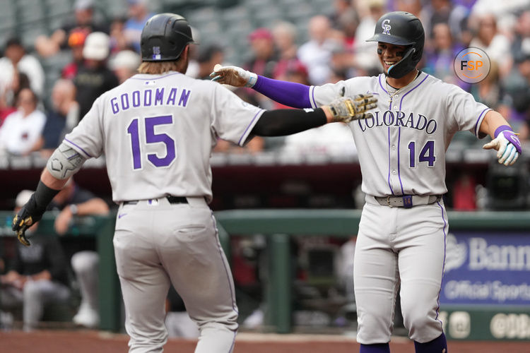 May 17, 2025; Phoenix, Arizona, USA;  Colorado Rockies catcher Hunter Goodman (15) celebrates home run with Colorado Rockies shortstop Ezequiel Tovar (14) against the Arizona Diamondbacks in the first inning at Chase Field. Credit: Jacob Reiner-Imagn Images