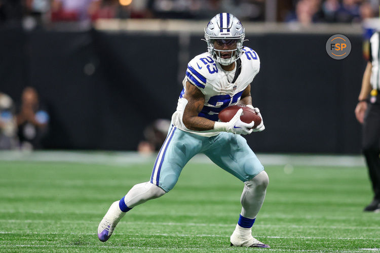 Nov 3, 2024; Atlanta, Georgia, USA; Dallas Cowboys running back Rico Dowdle (23) runs after a catch against the Atlanta Falcons in the fourth quarter at Mercedes-Benz Stadium. Credit: Brett Davis-Imagn Images