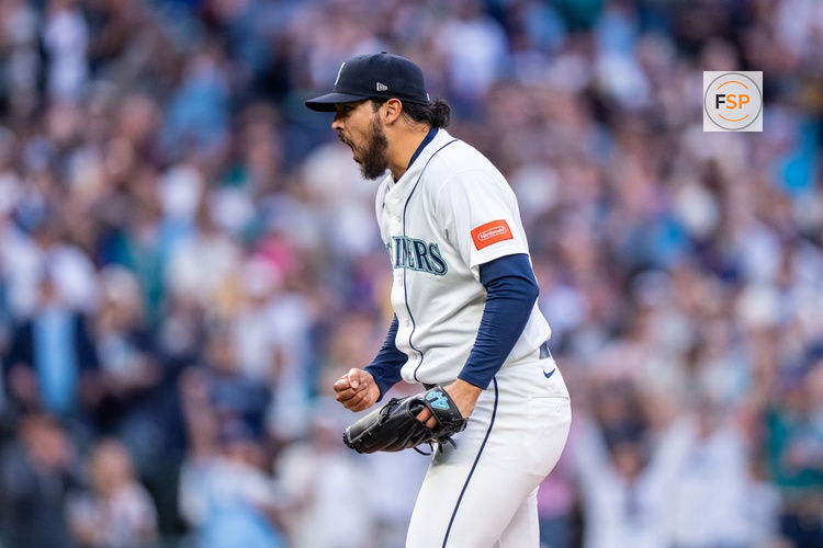 Apr 18, 2026; Seattle, Washington, USA; Seattle Mariners relief pitcher Andres Munoz (75) celebrates after a game against the Texas Rangers at T-Mobile Park. Credit: Stephen Brashear-Imagn Images