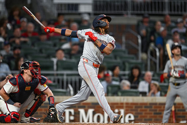 ATLANTA, GA – MAY 30:  Washington shortstop CJ Abrams (5) hits the ball deep during the MLB game between the Washington Nationals and the Atlanta Braves on May 30th, 2024 at Truist Park in Atlanta, GA. (Photo by Rich von Biberstein/Icon Sportswire)