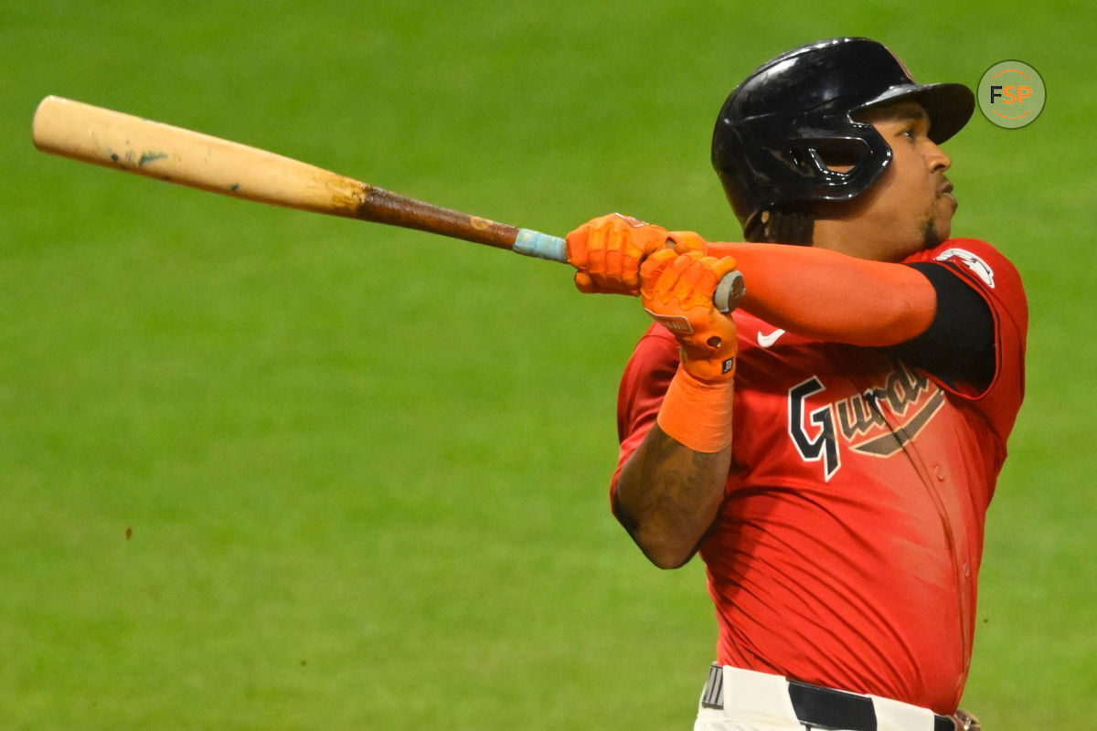 Sep 25, 2024; Cleveland, Ohio, USA; Cleveland Guardians third baseman Jose Ramirez (11) hits a three-run home run in the eighth inning against the Cincinnati Reds at Progressive Field. Credit: David Richard-Imagn Images