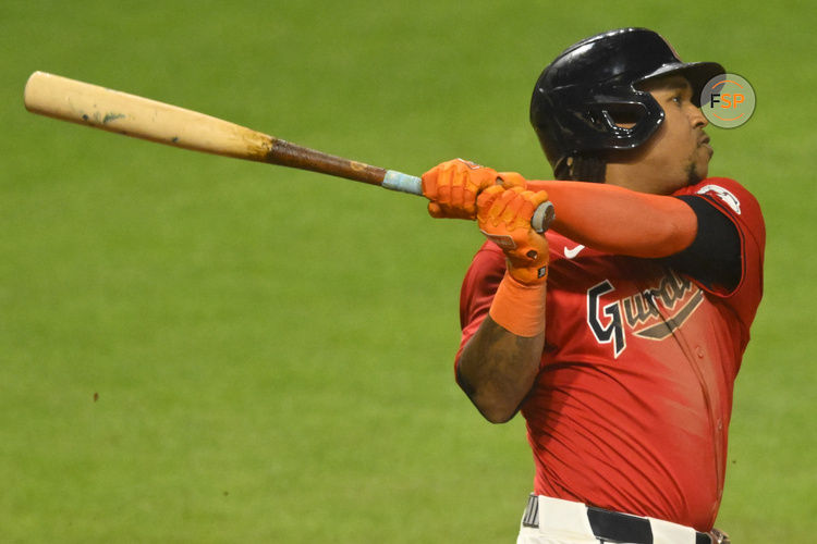 Sep 25, 2024; Cleveland, Ohio, USA; Cleveland Guardians third baseman Jose Ramirez (11) hits a three-run home run in the eighth inning against the Cincinnati Reds at Progressive Field. Credit: David Richard-Imagn Images