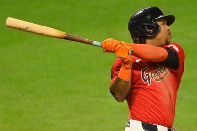 Sep 25, 2024; Cleveland, Ohio, USA; Cleveland Guardians third baseman Jose Ramirez (11) hits a three-run home run in the eighth inning against the Cincinnati Reds at Progressive Field. Mandatory Credit: David Richard-Imagn Images