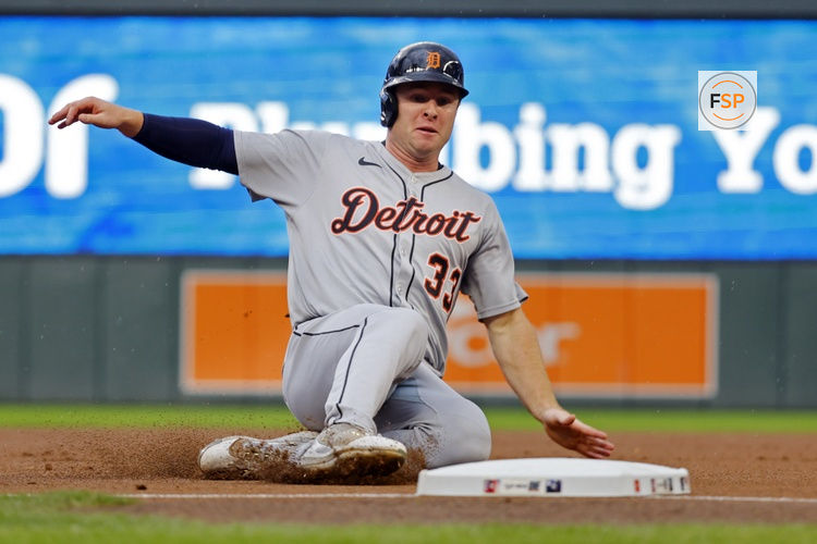 Aug 15, 2025; Minneapolis, Minnesota, USA; Detroit Tigers third baseman Colt Keith (33) slides into third base from first on a single by second baseman Gleyber Torres (not pictured) against the Minnesota Twins in the first inning at Target Field. Credit: Bruce Kluckhohn-Imagn Images