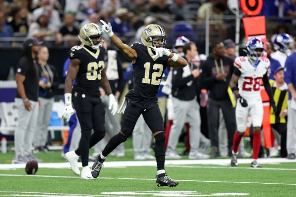 Oct 5, 2025; New Orleans, Louisiana, USA; New Orleans Saints wide receiver Chris Olave (12) reacts after a play against the New York Giants during the second half at Caesars Superdome. Mandatory Credit: Stephen Lew-Imagn Images