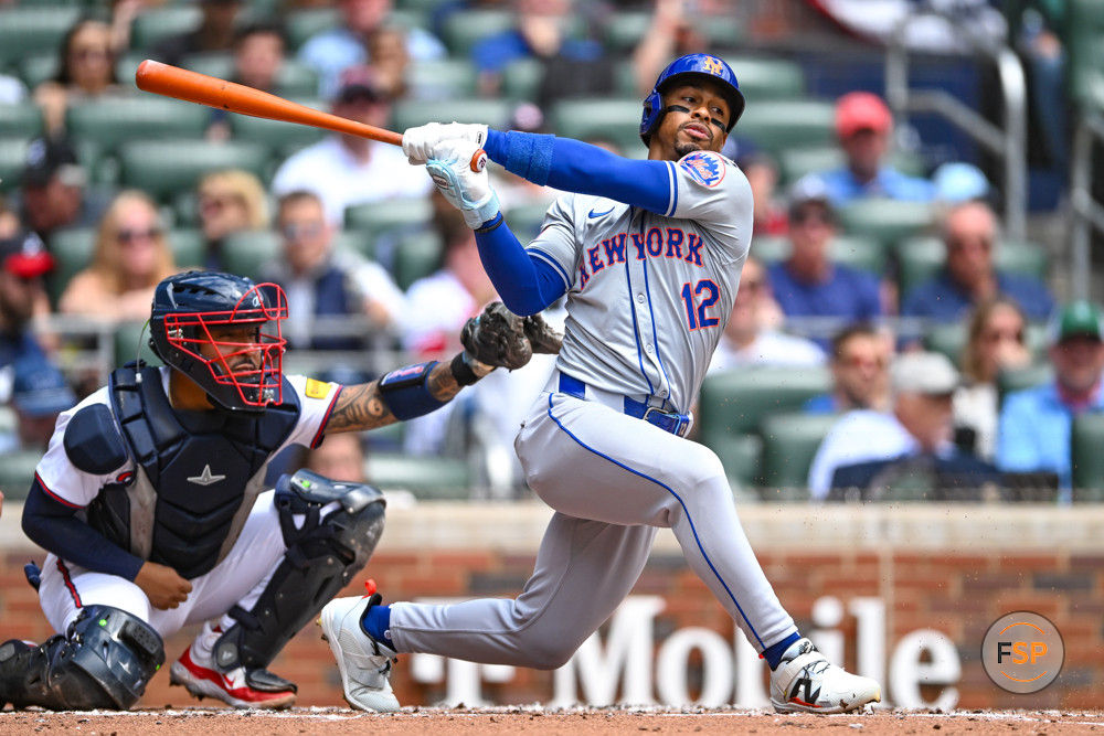 ATLANTA, GA – APRIL 11:  New York shortstop Francisco Lindor (12) swings at a pitch during the MLB game between the New York Mets and the Atlanta Braves on April 11th, 2024 at Truist Park in Atlanta, GA. (Photo by Rich von Biberstein/Icon Sportswire)