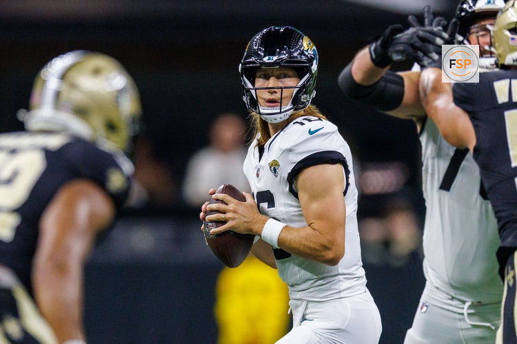 Aug 17, 2025; New Orleans, Louisiana, USA;  Jacksonville Jaguars quarterback Trevor Lawrence (16) looks downfield against the New Orleans Saints during the first half at Caesars Superdome. Credit: Stephen Lew-Imagn Images