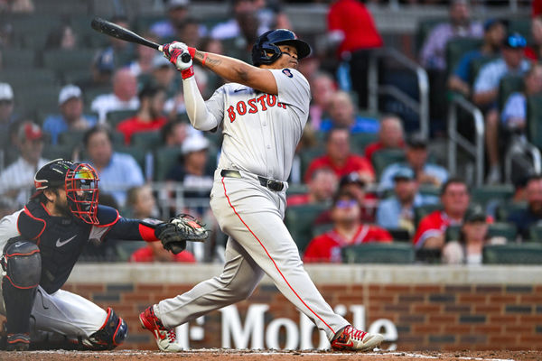 ATLANTA, GA – MAY 08:  Boston third baseman Rafael Devers (11) hits a line drive during the MLB game between the Boston Red Sox and the Atlanta Braves on May 8th, 2024 at Truist Park in Atlanta, GA. (Photo by Rich von Biberstein/Icon Sportswire)