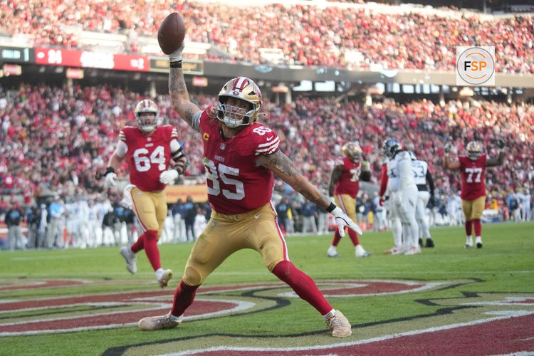 Dec 14, 2025; Santa Clara, California, USA;  San Francisco 49ers tight end George Kittle (85) scores a touchdown during the third quarter against the Tennessee Titans at Levi's Stadium. Credit: Cary Edmondson-Imagn Images