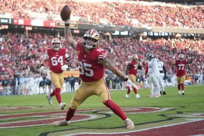 Dec 14, 2025; Santa Clara, California, USA;  San Francisco 49ers tight end George Kittle (85) scores a touchdown during the third quarter against the Tennessee Titans at Levi's Stadium. Mandatory Credit: Cary Edmondson-Imagn Images