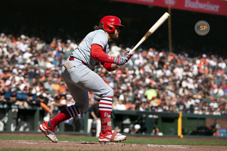 Sep 29, 2024; San Francisco, California, USA; St. Louis Cardinals second baseman Brendan Donovan (33) follows through on his RBI single against the San Francisco Giants during the fifth inning at Oracle Park. Credit: D. Ross Cameron-Imagn Images