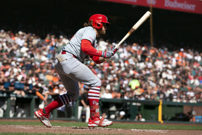 Sep 29, 2024; San Francisco, California, USA; St. Louis Cardinals second baseman Brendan Donovan (33) follows through on his RBI single against the San Francisco Giants during the fifth inning at Oracle Park. Mandatory Credit: D. Ross Cameron-Imagn Images