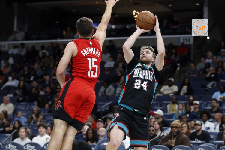 Mar 27, 2026; Memphis, Tennessee, USA; Memphis Grizzlies guard Cam Spencer (24) shoots against Houston Rockets guard Reed Sheppard (15) during the first quarter at FedExForum. Credit: Petre Thomas-Imagn Images