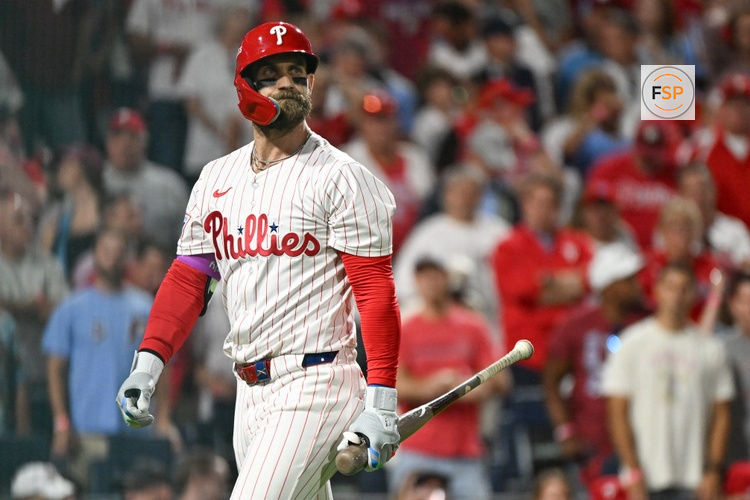 Oct 6, 2025; Philadelphia, Pennsylvania, USA; Philadelphia Phillies first baseman Bryce Harper (3) reacts to striking out against the Los Angeles Dodgers in the sixth inning during game two of the NLDS round for the 2025 MLB playoffs at Citizens Bank Park. Credit: Eric Hartline-Imagn Images
